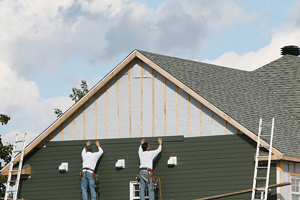 Professional Siding Contractor technician working in Long Creek, IL